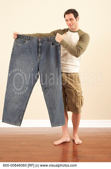 man-holding-oversized-pants.jpg